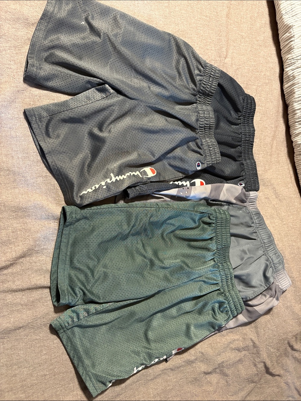 4 pairs boys athletic shorts - champion / Nike size 10/12